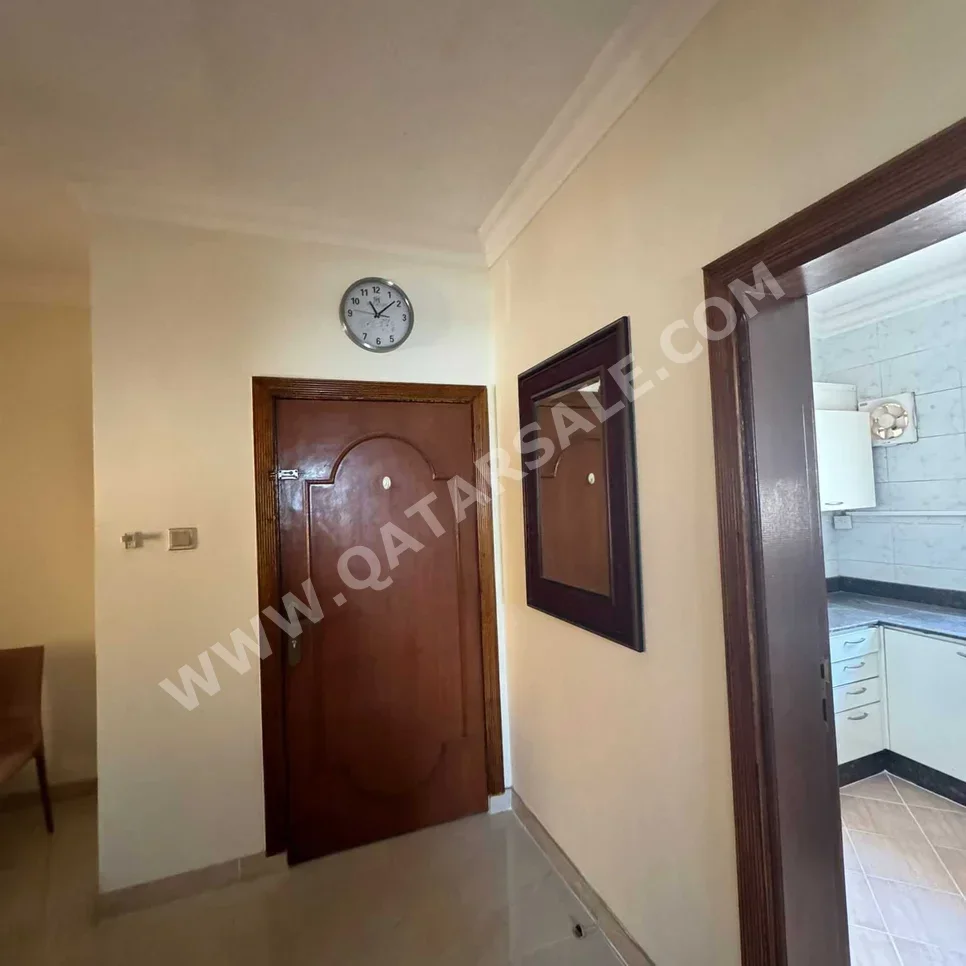 2 Bedrooms  Apartment  For Rent  in Doha -  Airport  Fully Furnished