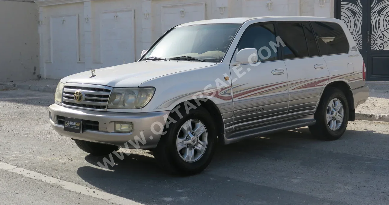  Toyota  Land Cruiser  GXR  2006  Automatic  302,000 Km  6 Cylinder  Four Wheel Drive (4WD)  SUV  White  With Warranty