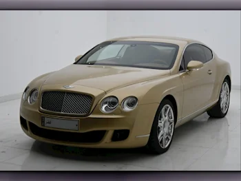 Bentley  Continental  GT  2009  Automatic  47,000 Km  12 Cylinder  All Wheel Drive (AWD)  Coupe / Sport  Gold
