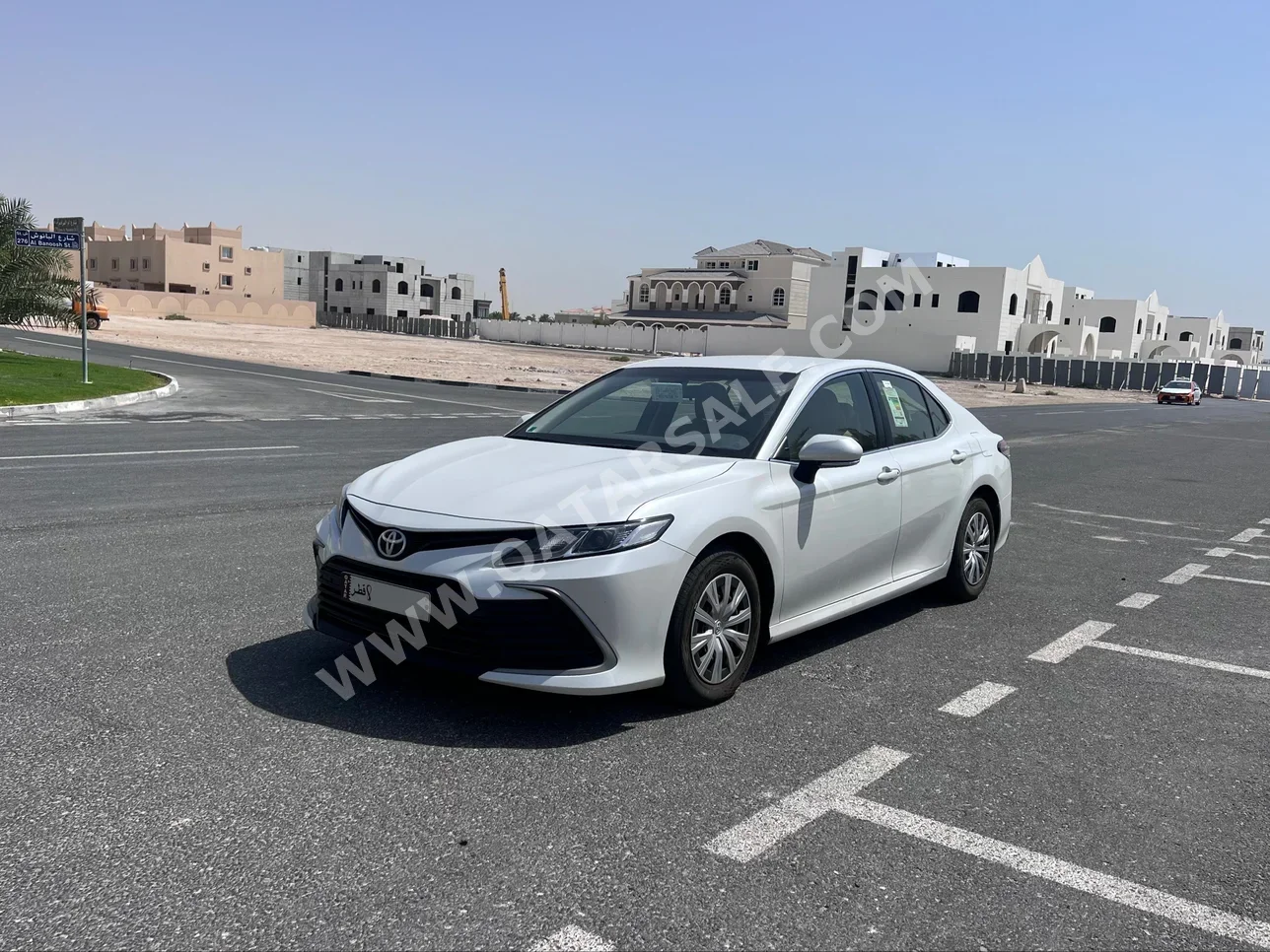  Toyota  Camry  LE  2022  Automatic  17,000 Km  4 Cylinder  Front Wheel Drive (FWD)  Sedan  White  With Warranty