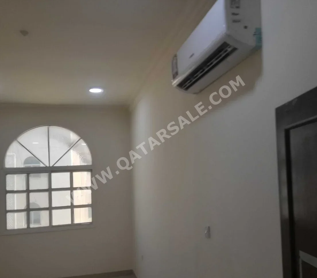 4 Bedrooms  Apartment  For Rent  in Doha -  Fereej Al Nasr  Not Furnished