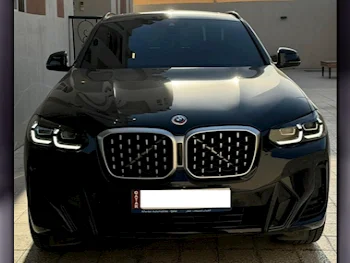 BMW  X-Series  X4 M  2023  Automatic  34٬000 Km  4 Cylinder  Four Wheel Drive (4WD)  SUV  Black  With Warranty