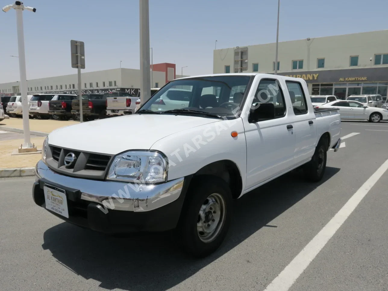 Nissan  Pickup  2014  Manual  327,000 Km  4 Cylinder  Rear Wheel Drive (RWD)  Pick Up  White