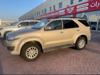 Toyota  Fortuner  2013  Automatic  249,000 Km  6 Cylinder  Four Wheel Drive (4WD)  SUV  Gold