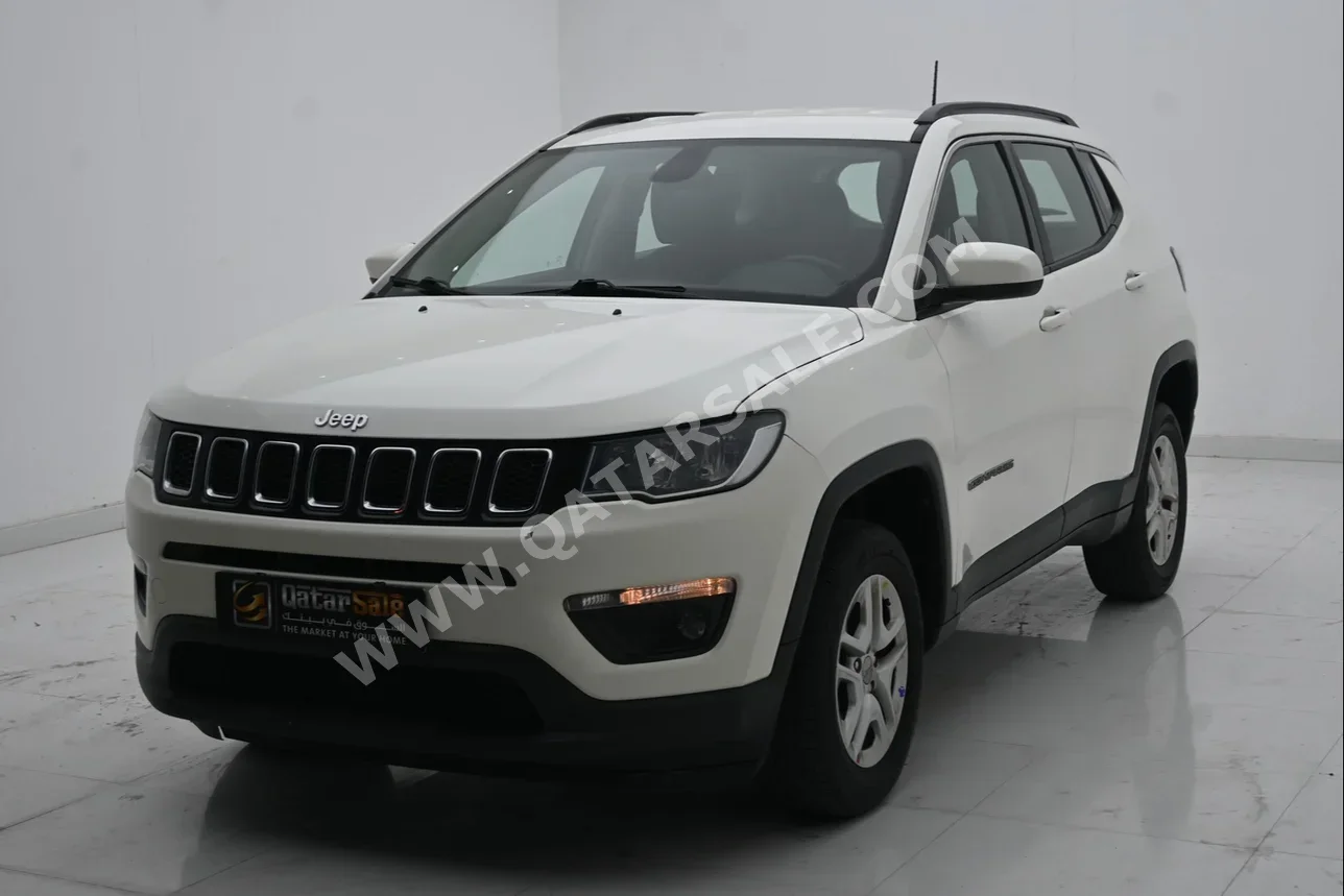 Jeep  Compass  longitude  2021  Automatic  65,000 Km  4 Cylinder  Four Wheel Drive (4WD)  SUV  White