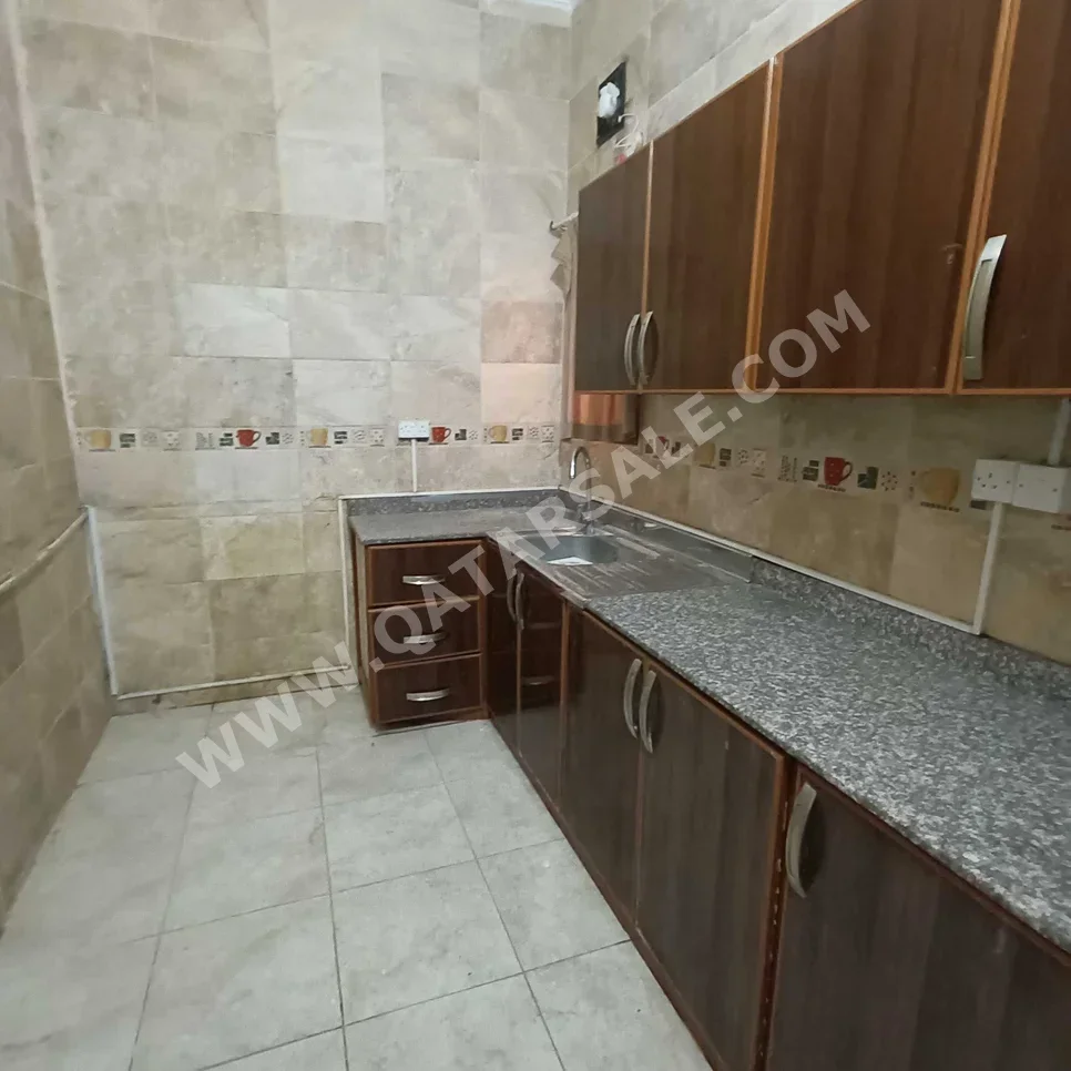 3 Bedrooms  Apartment  For Rent  in Umm Salal -  Al Kharaitiyat  Not Furnished