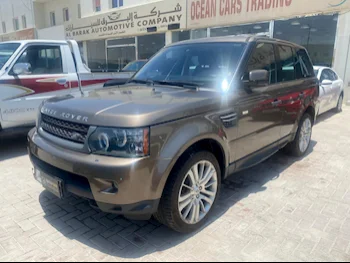 Land Rover  Range Rover  Sport HSE  2011  Automatic  153,000 Km  6 Cylinder  Four Wheel Drive (4WD)  SUV  Brown
