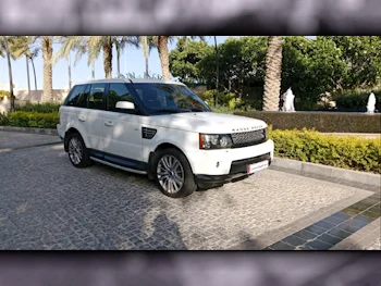 Land Rover  Range Rover  Sport HSE  2013  Automatic  122,000 Km  8 Cylinder  Four Wheel Drive (4WD)  SUV  White