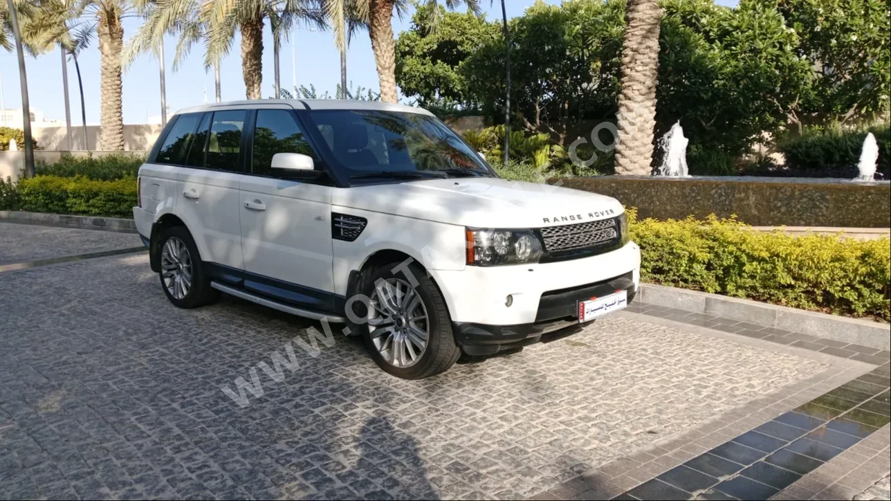 Land Rover  Range Rover  Sport HSE  2013  Automatic  122,000 Km  8 Cylinder  Four Wheel Drive (4WD)  SUV  White
