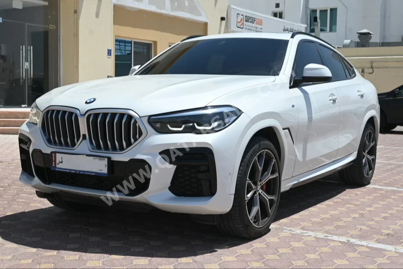 BMW  X-Series  X6  2022  Automatic  45,000 Km  6 Cylinder  Four Wheel Drive (4WD)  SUV  White  With Warranty