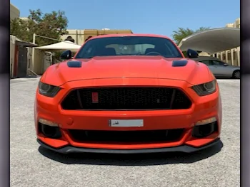 Ford  Mustang  GT Premium  2015  Automatic  182٬000 Km  8 Cylinder  Rear Wheel Drive (RWD)  Coupe / Sport  Orange