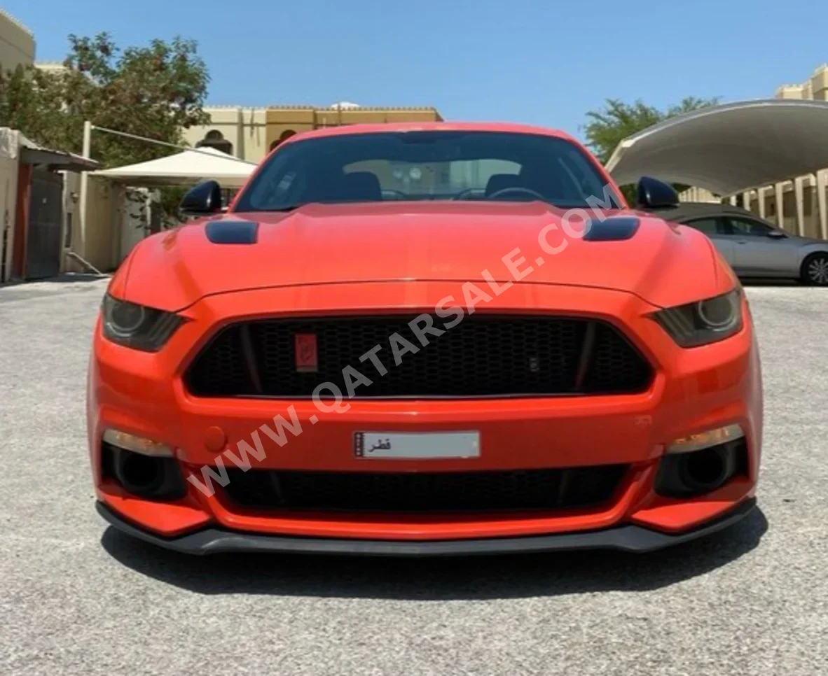 Ford  Mustang  GT Premium  2015  Automatic  182٬000 Km  8 Cylinder  Rear Wheel Drive (RWD)  Coupe / Sport  Orange