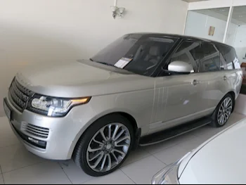 Land Rover  Range Rover  Vogue HSE  2014  Automatic  162,000 Km  8 Cylinder  Four Wheel Drive (4WD)  SUV  Gold