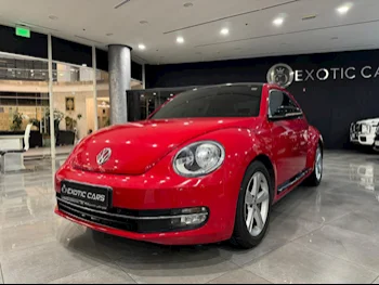Volkswagen  Beetle  Turbo  2015  Automatic  76,000 Km  4 Cylinder  Rear Wheel Drive (RWD)  Hatchback  Red