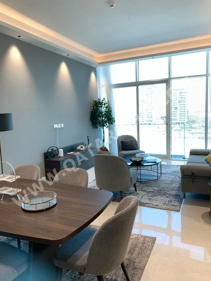 2 Bedrooms  Apartment  For Sale  in Lusail -  Al Kharayej  Semi Furnished