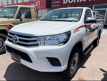 Toyota  Hilux  2023  Manual  9,000 Km  4 Cylinder  Four Wheel Drive (4WD)  Pick Up  White  With Warranty