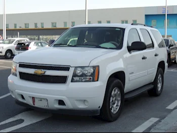 Chevrolet  Tahoe  2014  Automatic  208,000 Km  8 Cylinder  Four Wheel Drive (4WD)  SUV  White  With Warranty