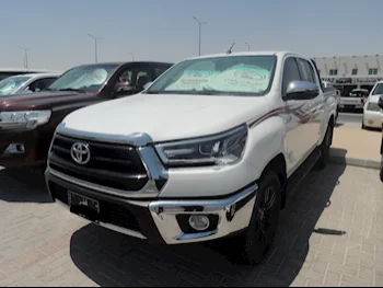  Toyota  Hilux  SR5  2022  Automatic  85,000 Km  4 Cylinder  Four Wheel Drive (4WD)  Pick Up  White  With Warranty