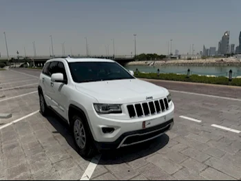 Jeep  Grand Cherokee  Limited  2014  Automatic  95,000 Km  8 Cylinder  Four Wheel Drive (4WD)  SUV  White