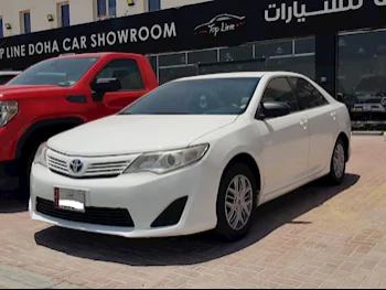  Toyota  Camry  GL  2014  Automatic  400,000 Km  4 Cylinder  Front Wheel Drive (FWD)  Sedan  White  With Warranty