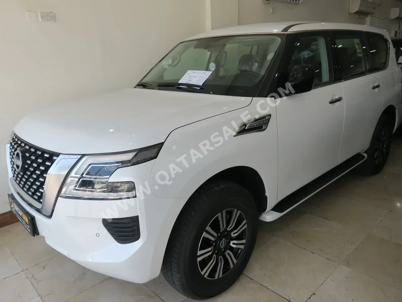  Nissan  Patrol  XE  2023  Automatic  0 Km  6 Cylinder  Four Wheel Drive (4WD)  SUV  White  With Warranty