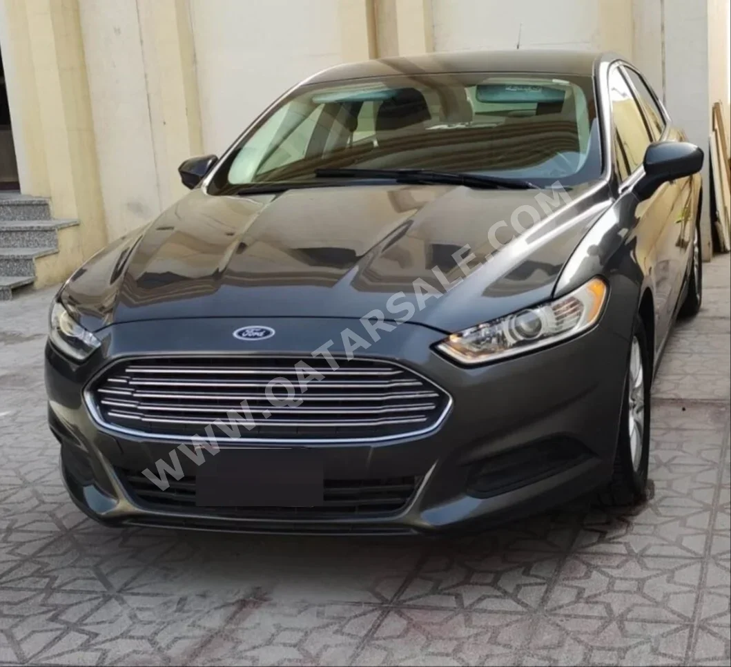 Ford  Fusion  2016  Automatic  102,000 Km  4 Cylinder  Front Wheel Drive (FWD)  Sedan  Gray Matte