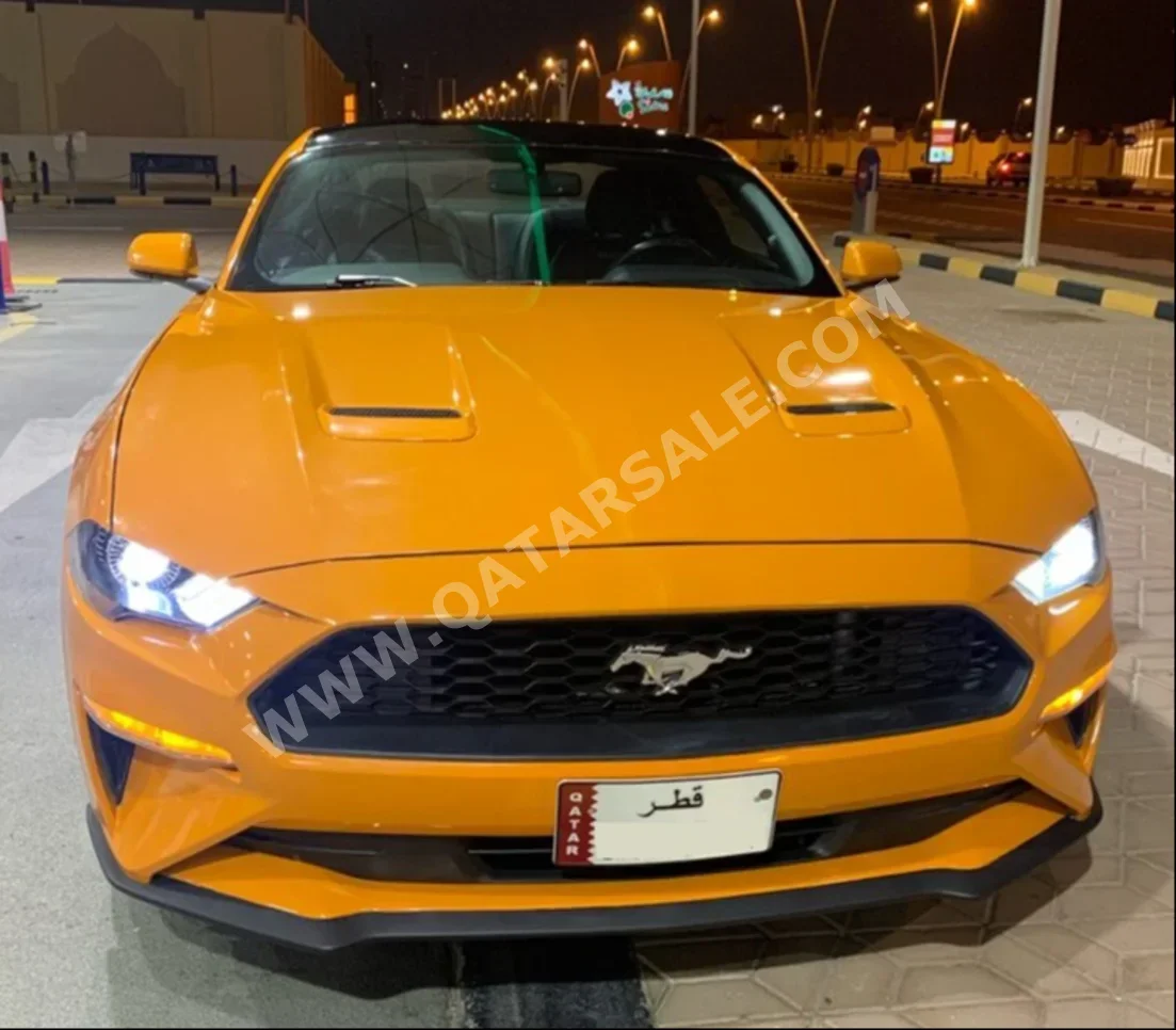 Ford  Mustang  Ecoboost  2019  Automatic  60,000 Km  4 Cylinder  Rear Wheel Drive (RWD)  Coupe / Sport  Orange
