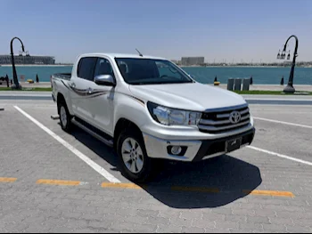 Toyota  Hilux  SR5  2019  Automatic  240,000 Km  4 Cylinder  Four Wheel Drive (4WD)  Pick Up  White