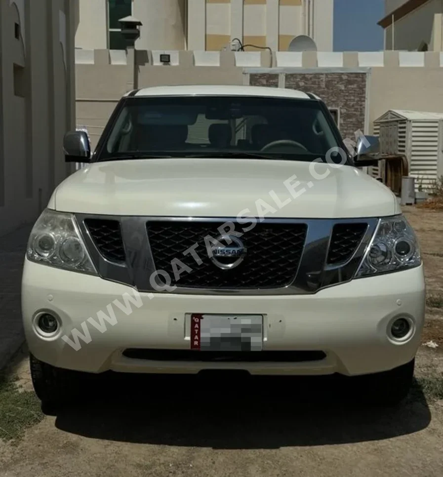 Nissan  Patrol  LE  2010  Automatic  240,682 Km  8 Cylinder  Four Wheel Drive (4WD)  SUV  Pearl