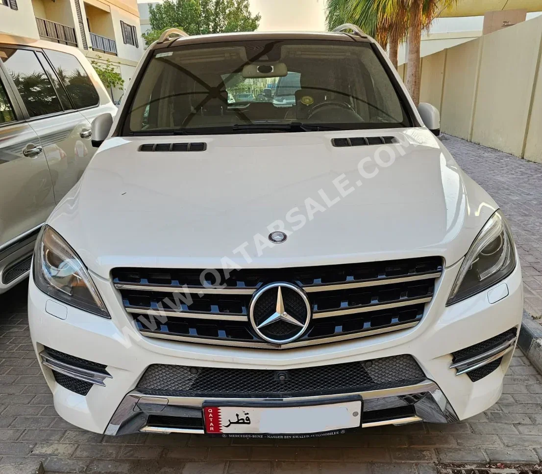 Mercedes-Benz  ML  400  2015  Automatic  91,000 Km  4 Cylinder  Rear Wheel Drive (RWD)  SUV  White