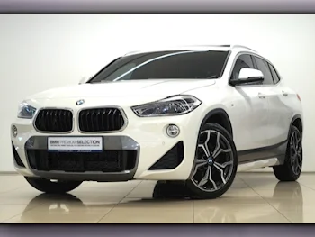 BMW  X-Series  X2  2021  Automatic  30٬600 Km  4 Cylinder  Front Wheel Drive (FWD)  SUV  White  With Warranty
