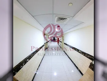 2 Bedrooms  Apartment  For Rent  in Doha -  Umm Ghuwailina  Not Furnished
