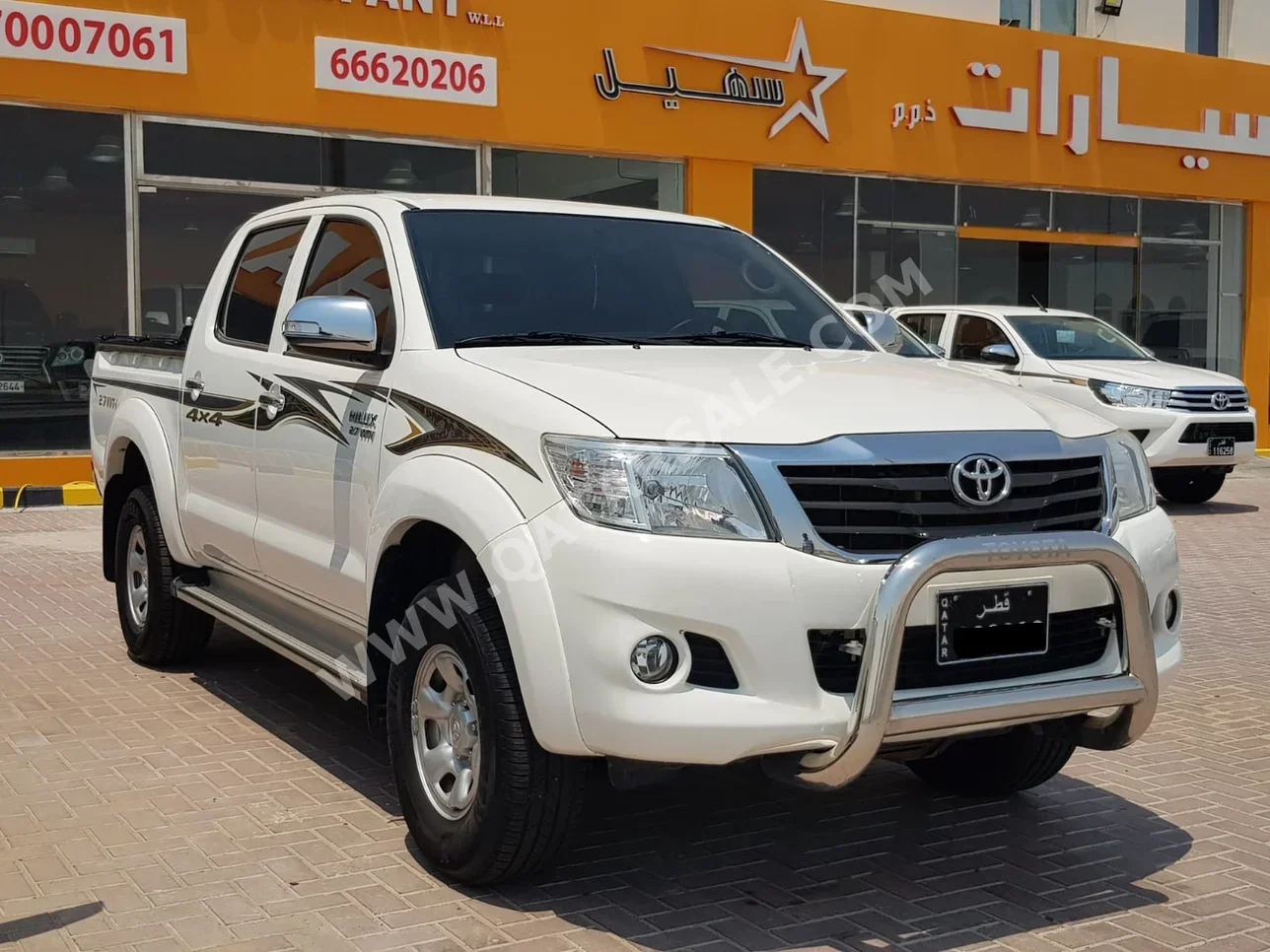 Toyota  Hilux  2015  Automatic  91,000 Km  4 Cylinder  Four Wheel Drive (4WD)  Pick Up  White