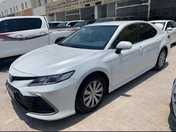 Toyota  Camry  LE  2021  Automatic  64,000 Km  4 Cylinder  Front Wheel Drive (FWD)  Sedan  White