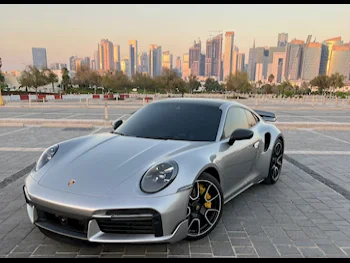 Porsche  911  Turbo S  2021  Automatic  44,000 Km  6 Cylinder  Rear Wheel Drive (RWD)  Coupe / Sport  Gray  With Warranty