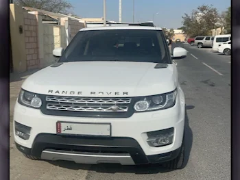 Land Rover  Range Rover  Sport HSE  2014  Automatic  94,000 Km  6 Cylinder  Four Wheel Drive (4WD)  SUV  Pearl