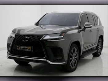 Lexus  LX  600 F Sport  2023  Automatic  31,000 Km  6 Cylinder  Four Wheel Drive (4WD)  SUV  Black and Red  With Warranty