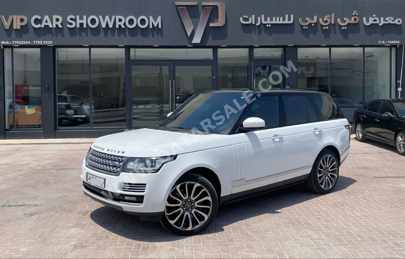  Land Rover  Range Rover  Vogue  Autobiography  2015  Automatic  150,000 Km  8 Cylinder  Four Wheel Drive (4WD)  SUV  White  With Warranty