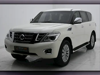  Nissan  Patrol  LE  2014  Automatic  232,000 Km  8 Cylinder  Four Wheel Drive (4WD)  SUV  White  With Warranty