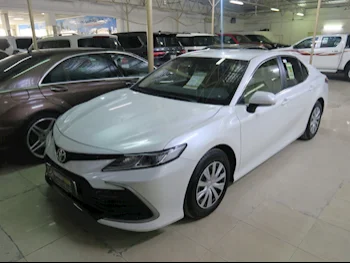 Toyota  Camry  LE  2023  Automatic  6,000 Km  4 Cylinder  Front Wheel Drive (FWD)  Sedan  White  With Warranty