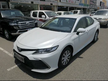 Toyota  Camry  LE  2024  Automatic  0 Km  4 Cylinder  Front Wheel Drive (FWD)  Sedan  White  With Warranty