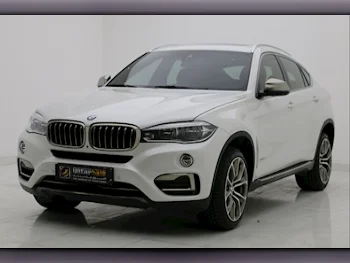 BMW  X-Series  X6 50i  2016  Automatic  143,000 Km  8 Cylinder  Four Wheel Drive (4WD)  SUV  White