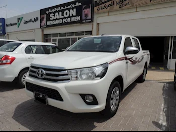 Toyota  Hilux  2022  Automatic  58,000 Km  4 Cylinder  Four Wheel Drive (4WD)  Pick Up  White  With Warranty