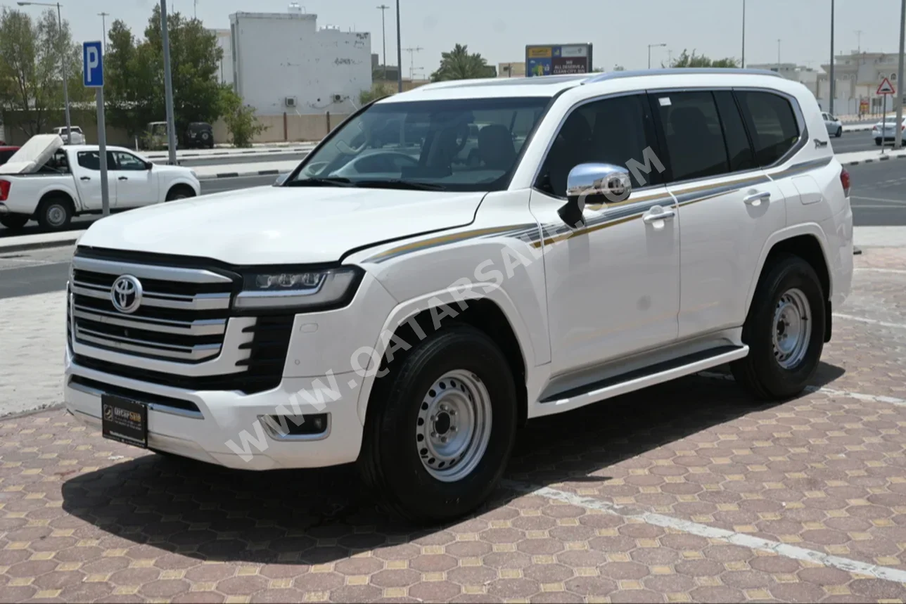  Toyota  Land Cruiser  VX Twin Turbo  2022  Automatic  60,000 Km  6 Cylinder  Four Wheel Drive (4WD)  SUV  White  With Warranty