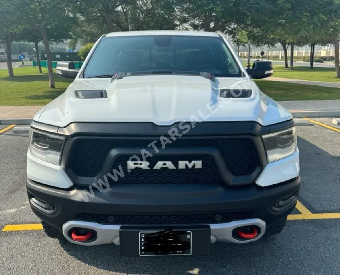 Dodge  Ram  Rebel  2019  Automatic  49,000 Km  8 Cylinder  Four Wheel Drive (4WD)  Pick Up  White  With Warranty
