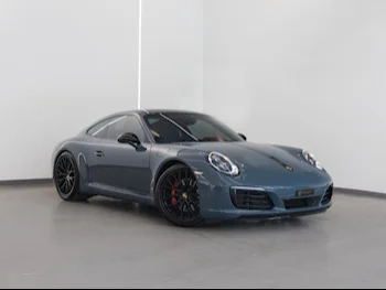 Porsche  911  Carrera S  2017  Automatic  76,900 Km  6 Cylinder  All Wheel Drive (AWD)  Coupe / Sport  Gray  With Warranty