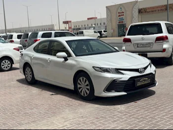 Toyota  Camry  LE  2023  Automatic  39,000 Km  4 Cylinder  Front Wheel Drive (FWD)  Sedan  White  With Warranty