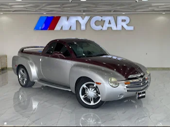 Chevrolet  SSR  2005  Automatic  157,000 Km  6 Cylinder  Four Wheel Drive (4WD)  Pick Up  Red and Silver