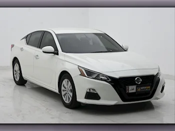 Nissan  Altima  2019  Automatic  59,000 Km  4 Cylinder  Front Wheel Drive (FWD)  Sedan  White