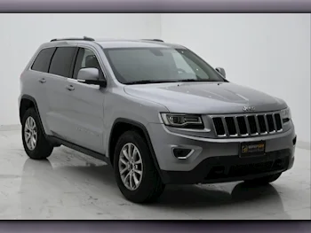 Jeep  Grand Cherokee  Laredo  2014  Automatic  129,000 Km  6 Cylinder  Four Wheel Drive (4WD)  SUV  Silver  With Warranty